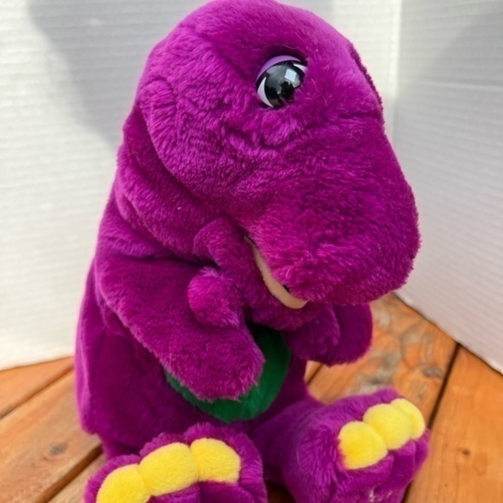 Sitting Barney The Purple Dinosaur Plush puppet.